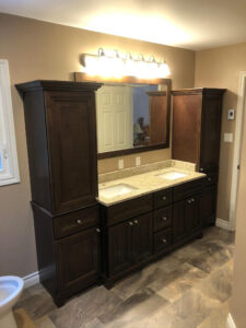bathroom renovation showing double sink and cabinets